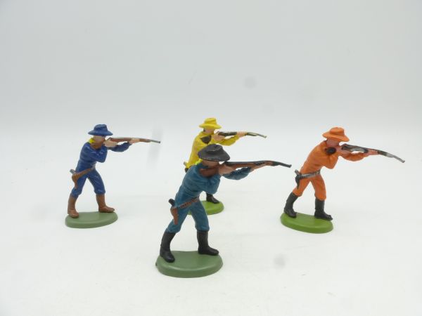 Britains Swoppets 4 Cowboys (different) standing shooting (made in HK)