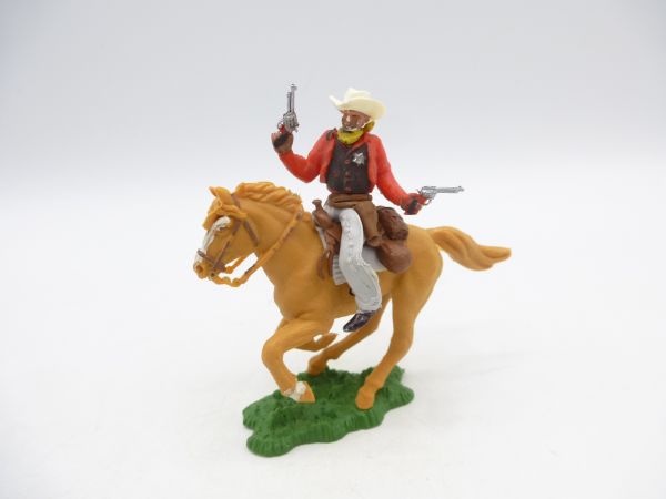 Britains Swoppets Cowboy riding, firing 2 pistols wildly