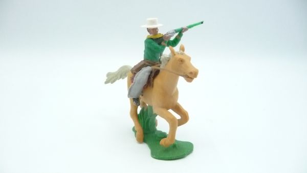 Britains Swoppets Cowboy riding, firing rifle sideways - great horse