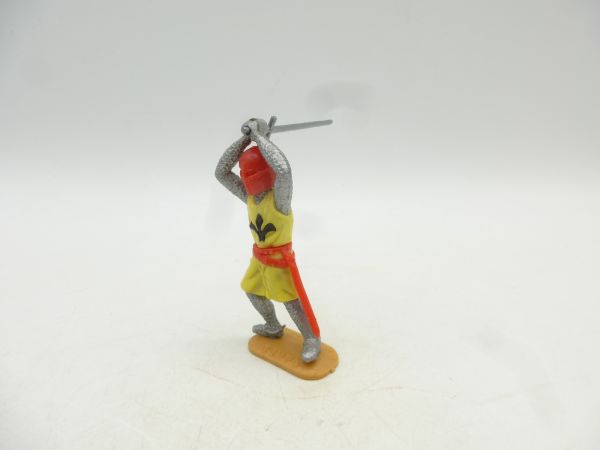 Timpo Toys Mittelalterritter stehend, gelb/rot, Schwert beidhändig