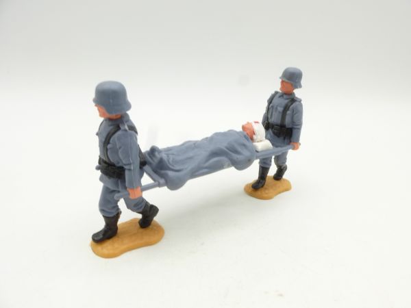 Timpo Toys 2 Germans 3rd version with wounded man on stretcher