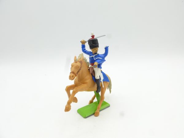 Britains Deetail Waterloo soldier riding, sabre striking, blue uniform
