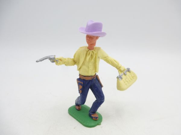 Timpo Toys Cowboy 1. Version vorgehend mit Pistole + Geldtasche