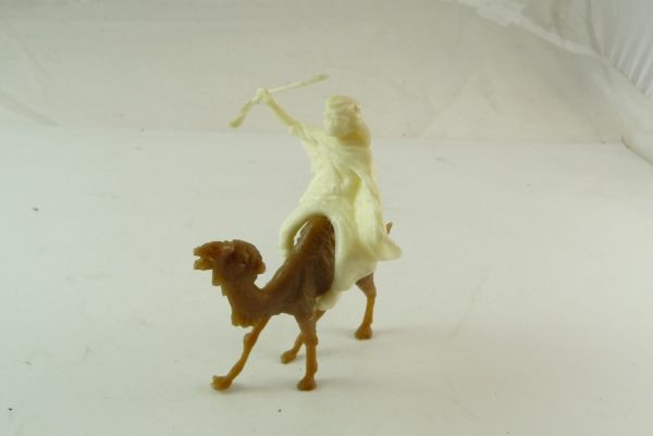 Domplast-Manurba Bedouin on camel, holding up rifle