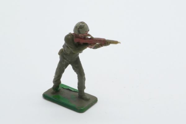 Crescent American soldier, firing with rifle