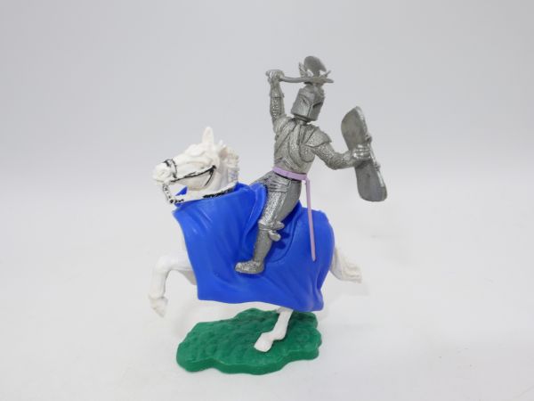 Timpo Toys Silver knight riding with battle axe, 1st version, blue blanket
