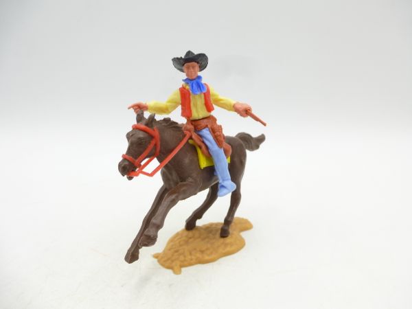 Timpo Toys Cowboy 2. Version reitend mit Gewehr, zeigend
