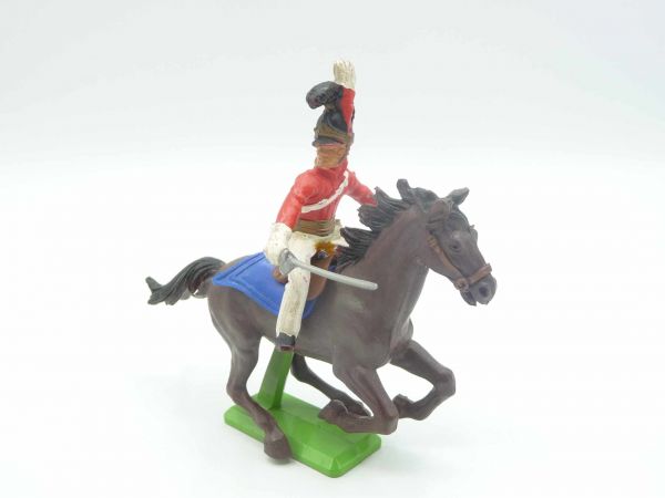 Britains Deetail Waterloo; soldier riding, red, holding sabre down, looking to the right