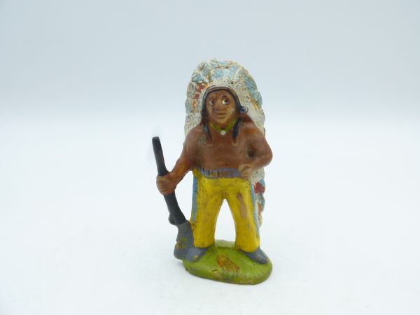 Chief standing with rifle - used