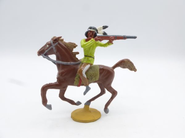 Merten Indian riding, firing rifle sideways