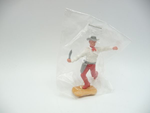 Timpo Toys Cowboy 3rd version running with knife - in original bag