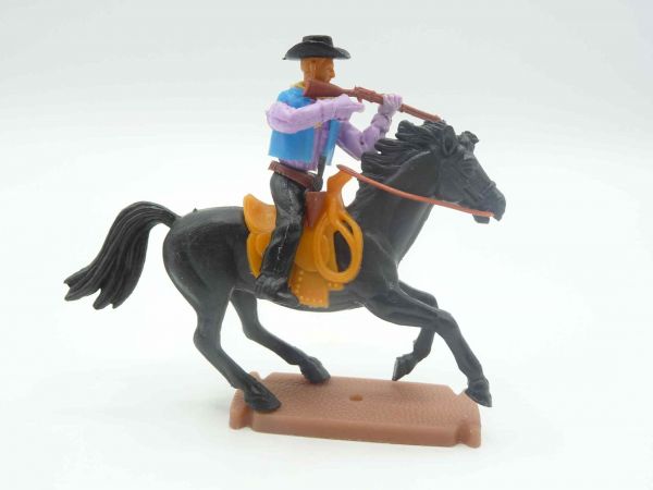 Plasty Cowboy on rare horse, firing rifle