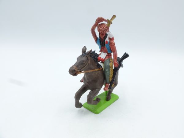 Britains Deetail Indian riding, striking with tomahawk
