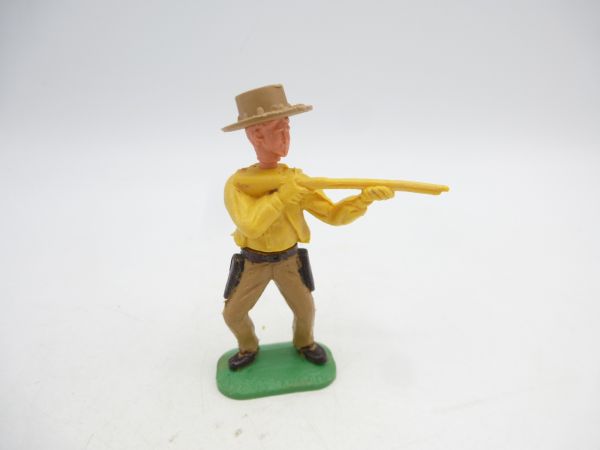 Timpo Toys Cowboy 1. Version stehend schießend, gelb, beiger Hut