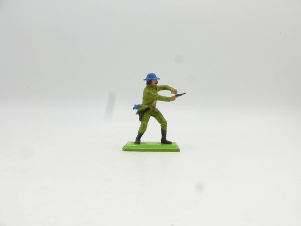 Britains Deetail Cowboy standing, shooting pistol ambidextrously, green