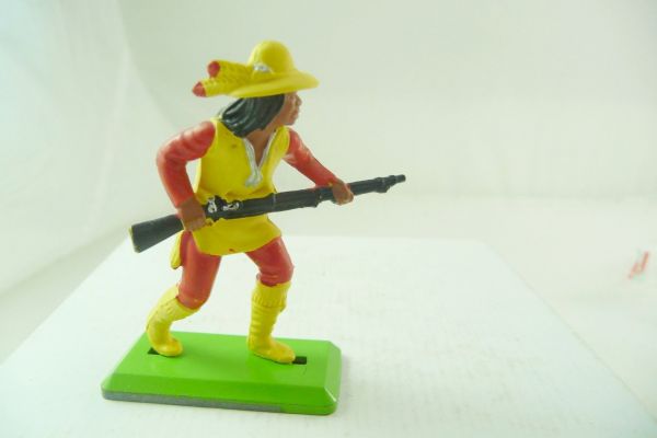 Britains Deetail Apache going ahead with rifle in front of the body, yellow/red