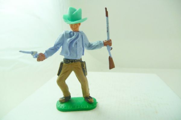 Timpo Toys Cowboy 1. version with pistol + rifle + mint-coloured hat