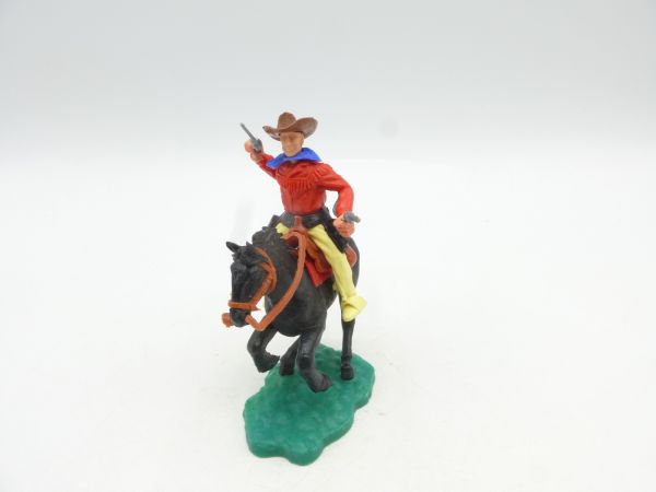 Timpo Toys Cowboy 2. Version reitend mit 2 Pistolen wild schießend