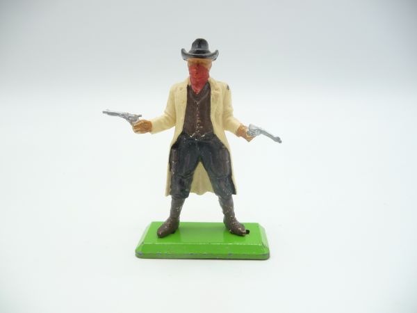 Britains Deetail Cowboy standing with long coat, firing 2 pistols
