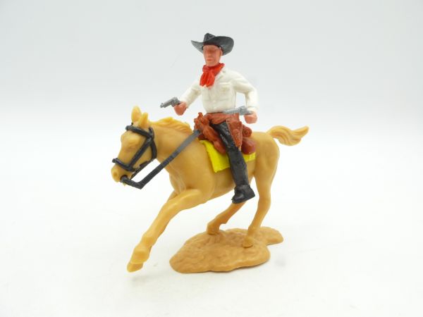 Timpo Toys Cowboy 2. Version reitend, 2 Pistolen schießend