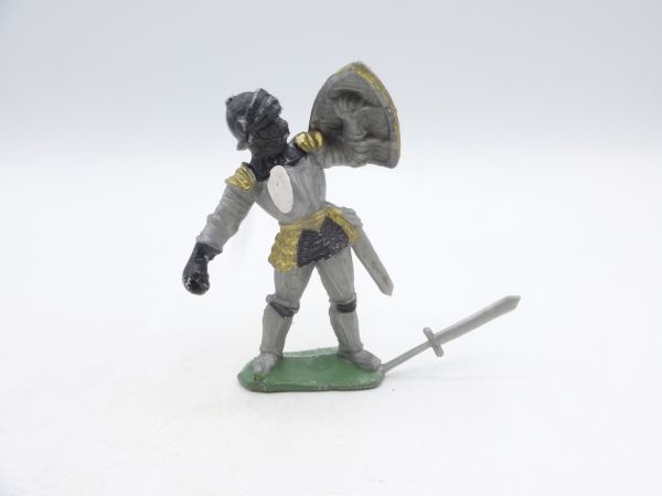 Knight standing with sword + shield