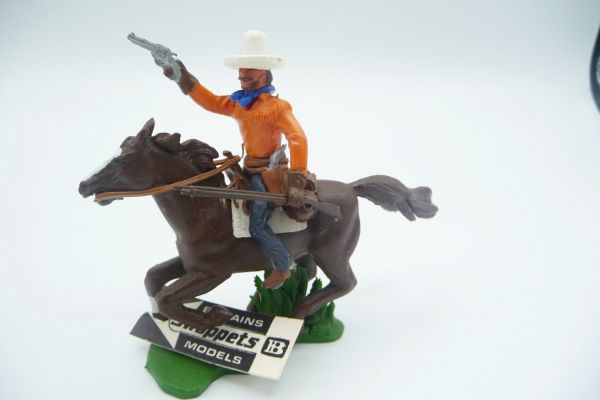 Britains Swoppets Cowboy riding, firing with pistol - brand new, with original tag