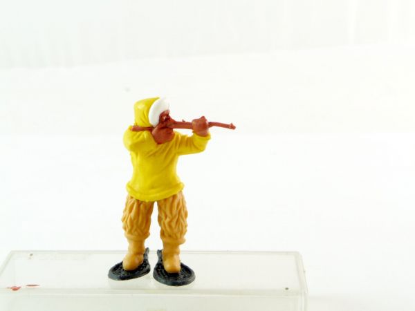 Timpo Toys Eskimo firing with rifle, dark-yellow / legs beige