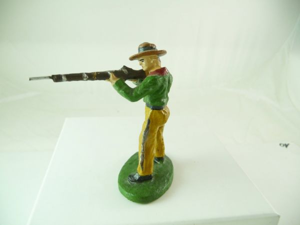Pfeiffer / Tipple Topple Cowboy stehend Gewehr schießend (grün)