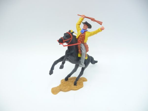 Timpo Toys Toller Cowboy, dunkelgelb, von Pfeil getroffen auf aufsteigendem Pferd