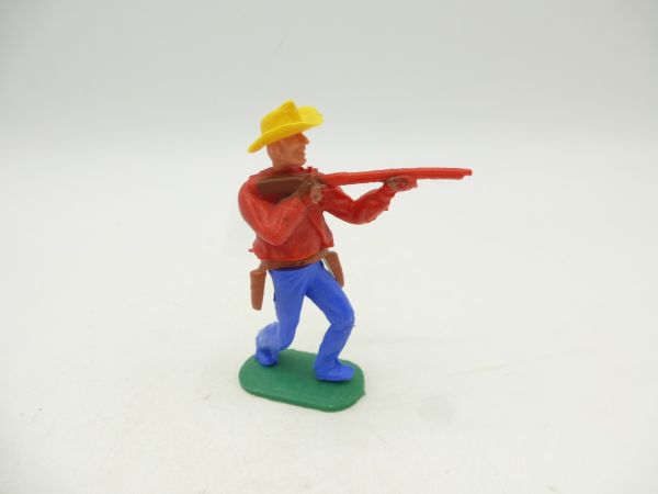 Timpo Toys Cowboy 1. Version, rot, Gewehr schießend