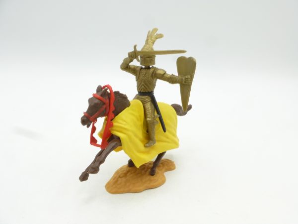 Timpo Toys Goldritter reitend, mit Schwert abwehrend + Schild