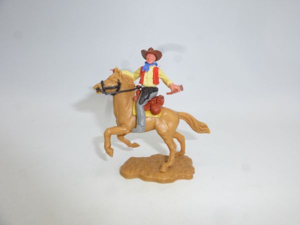 Timpo Toys Cowboy 2. Version reitend, Gewehr seitlich, zeigend