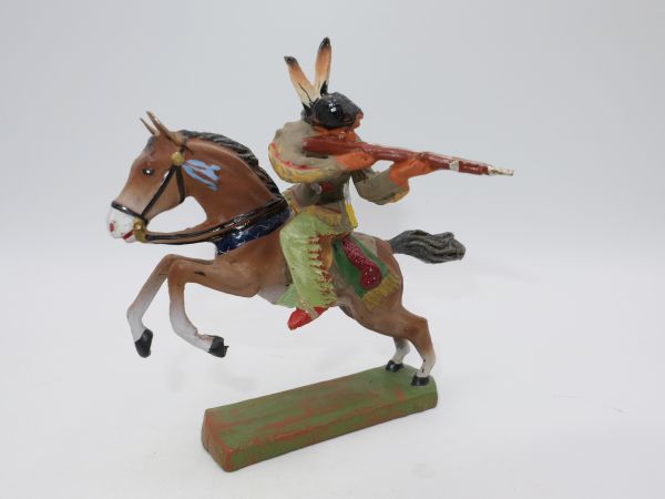 Elastolin composition Indian on horseback, shooting rifle backwards - brand new
