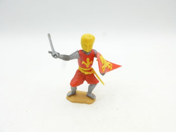 Timpo Toys Mittelalterritter stehend mit Schwert, rot/gelb