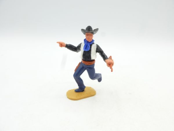 Timpo Toys Cowboy 2nd version running with rifle, pointing