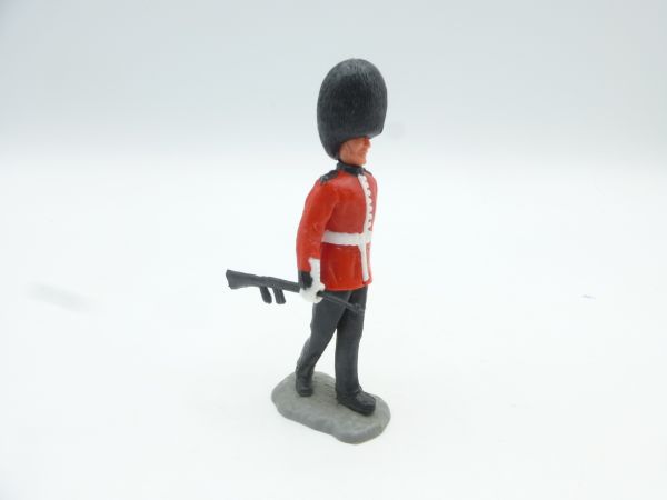 Timpo Toys Guardsman marching, rifle in right hand