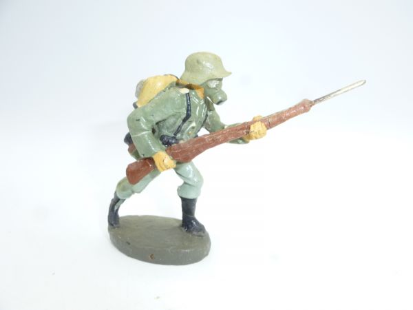 Elastolin composition Soldier with respirator mask, attacking with rifle