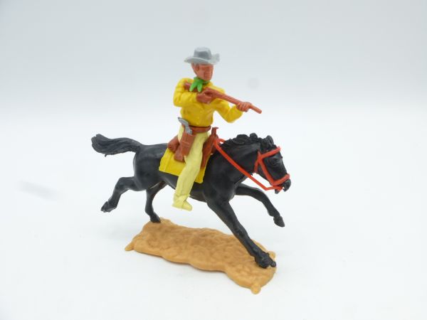 Timpo Toys Cowboy 3rd version riding, firing rifle