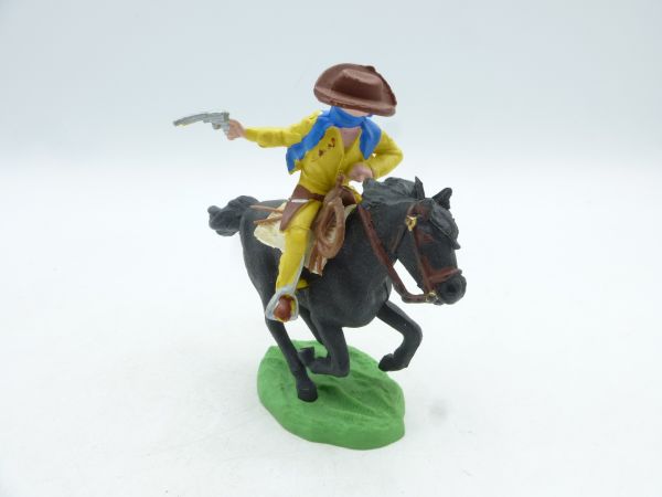 Britains Swoppets Cowboy riding, firing pistol to the rear