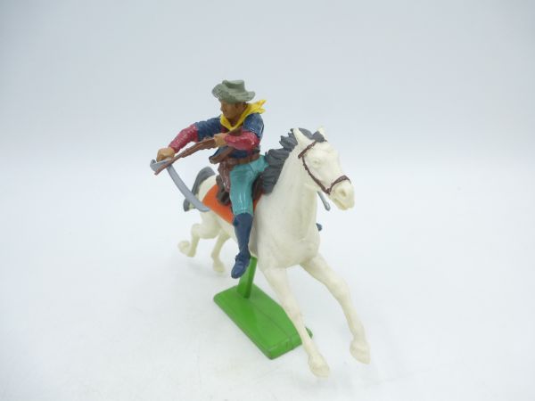 Britains Deetail Soldier 7th cavalry riding, rifle firing over sabre