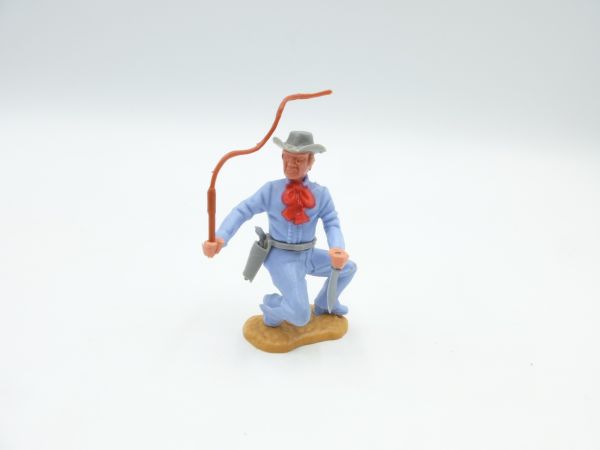 Timpo Toys Cowboy 3. Version hockend mit Peitsche + Messer - Top-Zustand