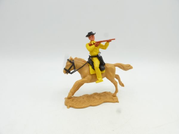 Timpo Toys Cowboy 3rd version riding, shooting short rifle