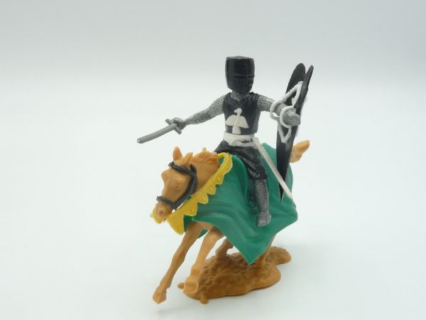 Timpo Toys Mittelalterritter reitend mit Schwert, schwarz/weiß