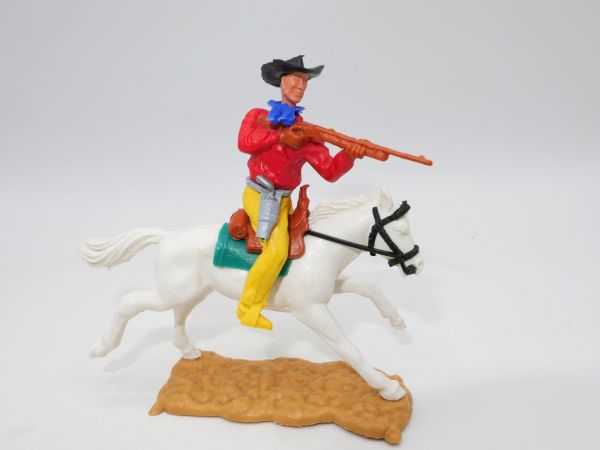 Timpo Toys Cowboy on horseback, shooting rifle - nice, dark yellow lower part