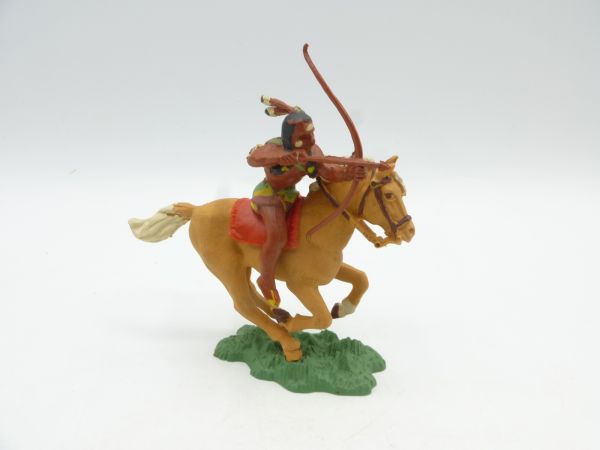 Britains Swoppets Indian on horseback, shooting with bow (made in England)