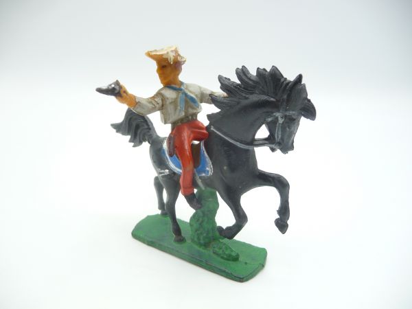 Cowboy riding with pistol - early figure