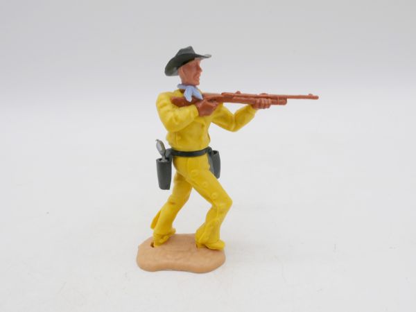 Timpo Toys Cowboy mit Gewehr + schwarzem Gurt