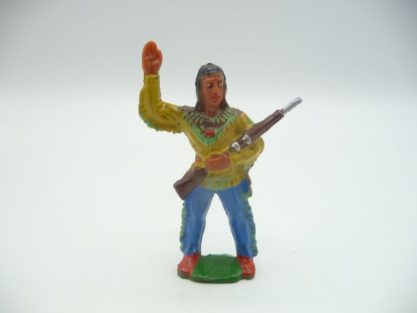 Winnetou standing with silver rifle, yellow shirt, blue trousers