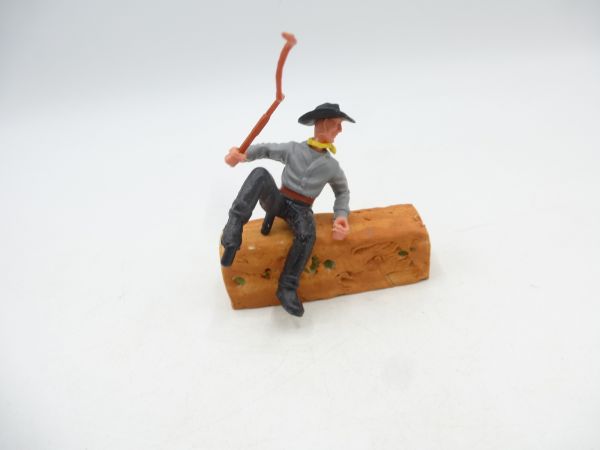 Timpo Toys Kutscher mit Peitsche, graues Oberteil