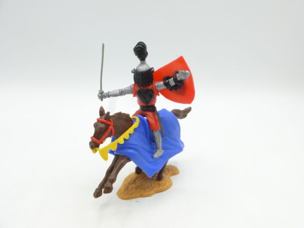 Timpo Toys Visierritter reitend mit Schwert, rot/schwarz